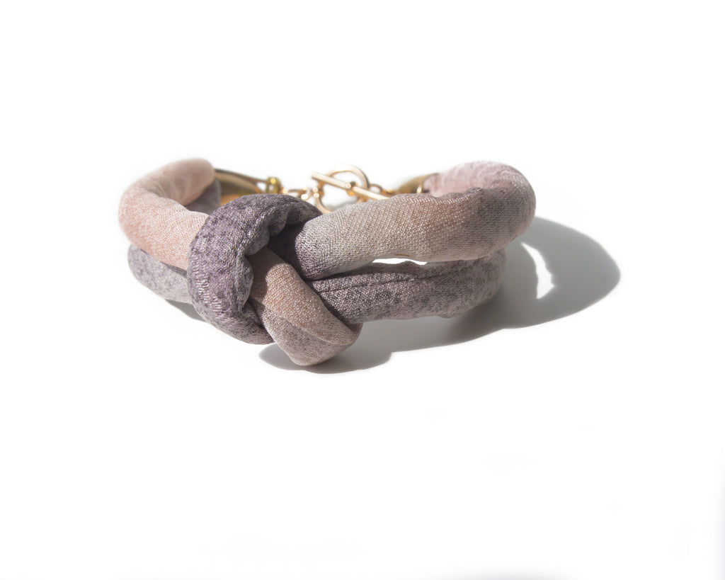handmade double layer knotted bracelet with brass closure. purple and pink ombre silk from a vintage kimono.