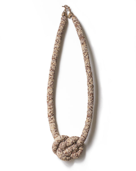 handmade single carrick knotted necklace with brass closure. abstract multi color marbled stone suminagashi print silk from a vintage kimono. brown cream