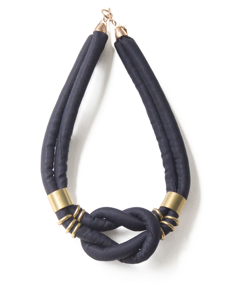 handmade square knotted choker necklace with brass beads and closure. navy silk.
