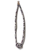 handmade single carrick knotted necklace with brass closure. abstract multi color print silk from a vintage kimono. black and white cream